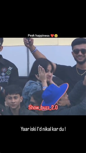 show_buzz_2.0 on Instagram: "Who is This Girl? 09 VIRAT KOHLI's HUGE FAN in the Stadium! | This viral video depicts three men in a sunny courtyard engaging in a comedic "training session" with squirt guns, mimicking serious drills that devolve into playful chaos and hysterical laughter from an onlooker child. —a curator of internet highlights—it amassed 484,000 views and 4,200 likes in under 24 hours, underscoring the rapid spread of feel-good, culturally resonant humor on X. The clip's appeal l