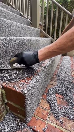 the process of plastering sand powder mixture on the stairs on the building terrace #construction