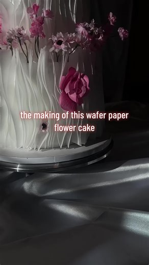 The making of a wafer paper flower engagement cake 🤍 Soft folds, delicate florals, and hours of detail coming together! Custom orders now open, kindly inquire via DM. #customcakes #waferpapercake #engagementcake #weddingcake #cakesoftiktok