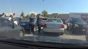 Bodycam footage shows Fairfax Co. officers fatally shooting a fugitive outside Springfield Town Center