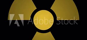 Radiation Symbol Flashing ON/OFF w/ Alpha. Graphic pictogram element of a yellow ionizing radiation warning sign blinking ON and OFF. Includes alpha channel for transparency.