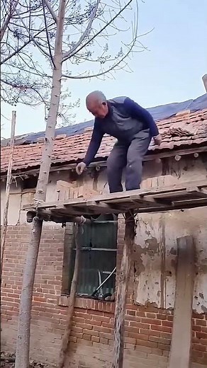 Throwing bricks onto roof process