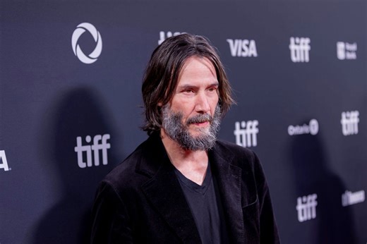 Keanu Reeves and girlfriend Alexandra Grant make rare red carpet appearance at 'Outcome' premiere