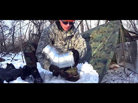 Heated winter tarp shelter in -3F with small homemade stove