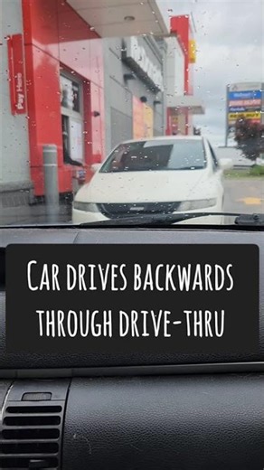 Car drives backwards at McDonald's drive thru