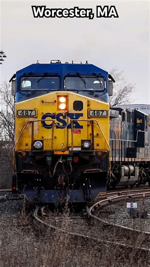 CSX M426 slowy passes by Worcester with a nice sunset in the background