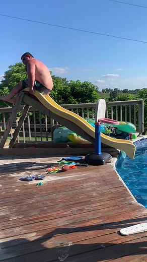 Has he ever seen a slide before? #reels #slide #pool #summer | America's Funniest Home Videos