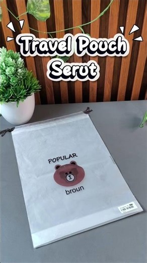 Travel Pouch Serut beli di pojok kanan atas