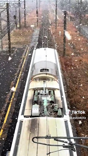 冬の雪と福北ゆたか線の直方駅