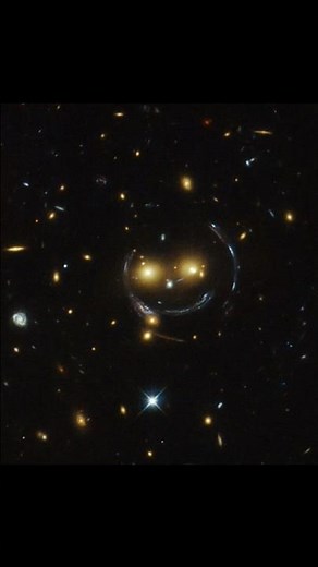 The Galaxy Cluster SDSS J1038+4849, A Cosmic Smiling Lens, 4.5 Billion Light Years, #shorts