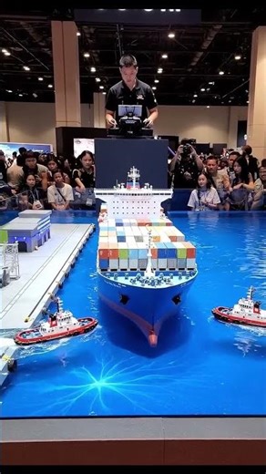 Two tiny tug boats controlling a giant ship — Satisfying Harbor Operation
