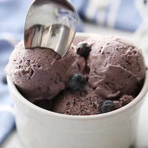 This fresh blueberry ice cream is the perfect way to enjoy those fresh blueberries this season. Find the full recipe here: https://www.yourhomebasedmom.com/fresh-blueberry-ice-cream/ | yourhomebasedmom