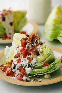 405K views · 1.3K reactions | Recipe here: https://therecipecritic.com/wedge-salad/ This classic wedge salad is a cool, crisp, and refreshingly tasty dish. Topped with bacon and blue cheese, this salad is simple to whip up, and it goes with just about anything! | Tried and True Recipes | Facebook
