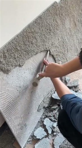 Remove the remaining cement on the ceramic using a hammer and chisel to remove the soft cement.