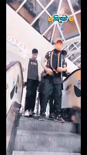 Synchronized Escalator Dance Performance at the Mall