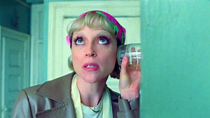 St. Vincent Pulls Off a Seventies-Style Scheme in New 'Down' Video