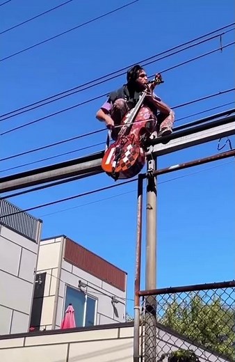 Mystical Urban “Fiddler Tweaker” Asserts his Dominance on a Powerline Tweaker Geographic
