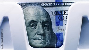 Close up of 100 US dollar bill with portrait of Benjamin Franklin. Bill counter counts hundred dollar banknotes for currency exchange. Automatic counting machine for cash money. Bank financial