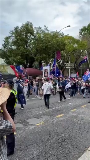 33K views · 3.4K reactions | WOW! A follower of mine just sent this video from Brisbane, Australia. There was a HUGE rally being held filled with Australian patriots and wouldn’t you know it… Even they are standing with Charlie Kirk. It’s amazing to see his spirit reach every corner of the world. | Barron Trump Fans | Facebook