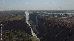 Incredible aerial view above the Devils Pool at Victoria Falls, revealing a big waterfall