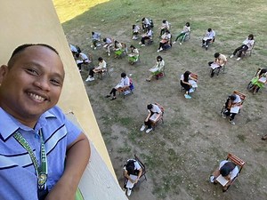 Innovative Teacher Conducts Exam on School Field to Address Heat & Cheating Concerns
