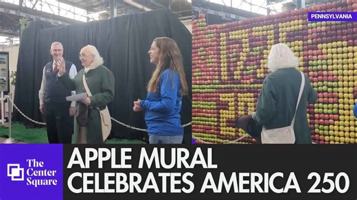 Benjamin Franklin reveals apple mural commemorating America's 250th birthday