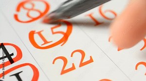 Business calendar dates eighth, fifteenth, twenty second and twenty third close-up