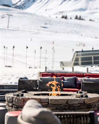 The Leading Hotels of the World on Instagram: "At @lek2altitude, après-ski unfolds at Base Kamp — the hotel’s slope-level lounge that opens directly into views of Courchevel’s peaks. Guests gather here for restful lunches on the sunny terrace, curated cocktails, and firelit afternoons between runs. The menu highlights comforting mountain flavors, while rotating DJs keep the atmosphere lively well past sunset. Whether you’re fresh off the piste or stopping by for a pick-me-up, Base Kamp captures