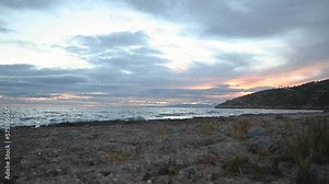 4K Fall sunset time-lapse with moving clouds over the Mediterranean Sea.