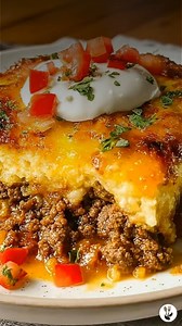This hearty Cattle Drive Casserole is pure comfort baked into every layer. A fluffy biscuit base, seasoned taco beef, creamy cheese topping, and melty goodness come together into a warm, satisfying dish that feels like home. Perfect for feeding a hungry crowd after a long day. Ingredients: • Cooking spray • 2 cups all-purpose baking mix (such as Bisquick) • 1¼ cups whole milk • 2 tablespoons vegetable oil, divided • 2 lbs ground beef (85/15) • 1 small yellow onion, finely chopped (about ½ cup) •