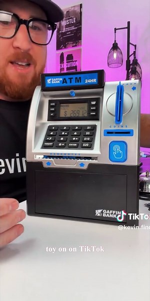 Talgic Kids Piggy Bank ATM Toy, a fun, interactive way to teach kids about money savings. With a realistic ATM keypad, password security, and the ability to save both coins and bills, it’s perfect for birthdays, holidays, TALGICKEV