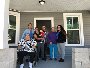 St. John's Jesuit students give family in need a new home