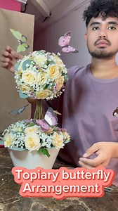 2.6M views · 114K reactions | Topiary buttery Design #bulaklakserye #komi #flower #flowerarrangement #flowershop #florist #bouquet #flowerbouquet #gift #giftideas #roses #bouquettutorial #diy #Craft #handmade #komiflowershop #komiflowersandgifts | Komi | Facebook
