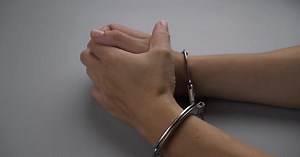 Female Hands in Handcuffs Closeuparrest for Breaking the Law Remorse for the Crime