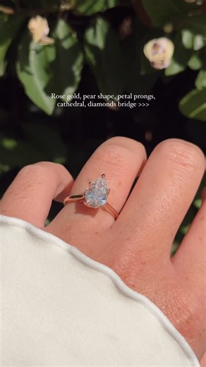Princess Bride Diamonds | Engagement Rings & Fine Jewelry on Instagram: "Rose gold, pear shape, petal prongs, cathedral, diamonds bridge >>> The Hana Pear Engagement Ring ✨ ✨ Save this for your future ring mood board! 💌 Send this to someone who needs a hint 😉 💍 Follow @PrincessBrideDiamonds for endless engagement ring inspo!"