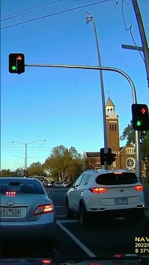 Red light camera flash. Hoddle St & Victoria Pde