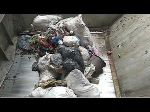 Very mixed garbage compaction \\ Transfer station \\ Original compactions sounds .