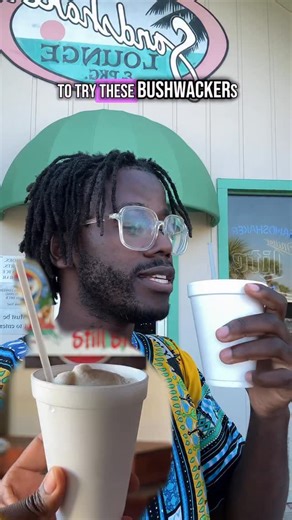 Dallas Lifestyle Blogger on Instagram: "🍹 If you visit Pensacola Beach and don’t try a Bushwacker… did you even go? 🌴 Born in the Virgin Islands in 1975, the Bushwacker found its true home at the @thesandshaker. It’s a creamy, boozy, and frozen, and became the beach’s signature drink. There’s even an annual Bushwacker Festival. Follow the Pensacola Bushwacker Trail to sip your way through 17 local spots — and earn prizes (and bragging rights) along the way. 🍹🌴 @Crabsonpensacolabeach had one 