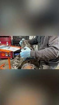 Assembling cylinder heads on a 350 small block Chevy