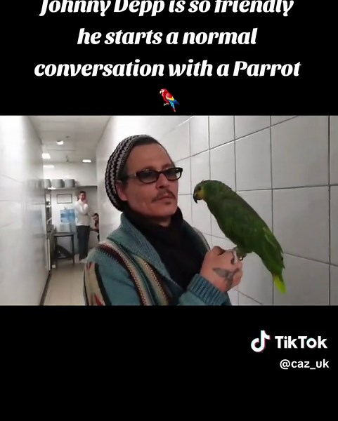 Did he just flirt with the parrot??