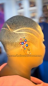 A clean low cut enhanced with sharp, flowing side waves carved into the fade, creating a bold yet balanced silhouette with smooth skin finish and crisp line work.✨ #naturalhairart | Haircuts for Women