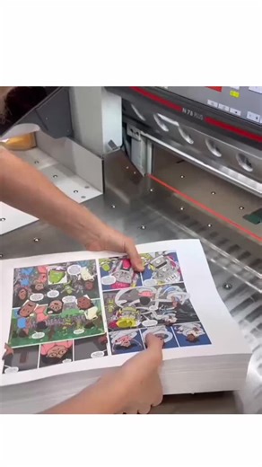 Daily Dose BD on Instagram: "In a high-precision printing facility, the seamless operation of an industrial guillotine brings a stack of vivid graphic illustrations to life. The Polar N 78 Plus machine utilizes an advanced hydraulic pressure system to stabilize the paper, ensuring that the heavy-gauge steel blade delivers a flawless edge every single time. This process is crucial for high-end comic book production, where even a millimeter of misalignment can ruin the visual flow of the artwork.