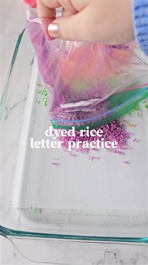 Make dyed rice by adding 1/3 cup of rice in a ziploc bag and 8 drops of food coloring. Mix and let dry on a cookie sheet (works best) or in the bags. Put a white piece of paper under a glass dish for the letters to show through! | Crafty Morning