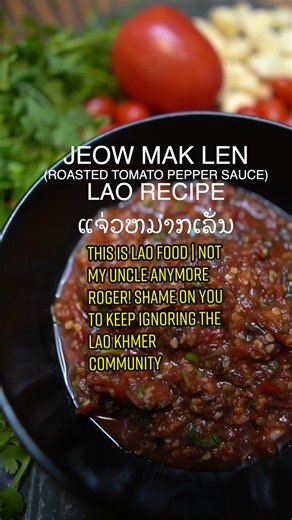 Replying to @VS' vieng Tuengmany This is Lao Food | Not My Uncle Anymore Roger! @mrnigelng Shame on you to keep ignoring and not Apologizing to the Lao & Khmer Community 🙅🏻‍♂️ (All Over Media 📰🗞️). I left a little Message for Him at the End of This Video 📝 Welcome to My 30 Popular Southeast Asian Recipes Series | Part 23 out of 30. Twenty-Third on My List is Spicy Garlicky Roasted Tomatoes Savory Dip Sauce | Lao Jeow Muk Len ແຈ່ວຫມາກເລັ່ນ 🍅🌶️🔥🧄 Jeow translates to Dipping Sauce. In the L