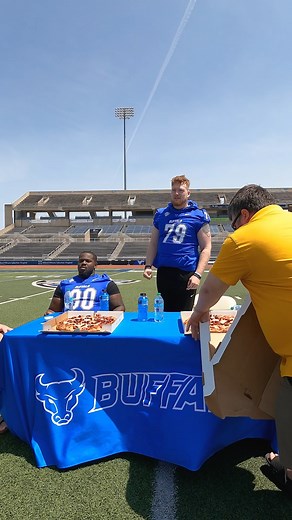 We challenged the UB Football team to showdown: can they conquer a Fatman's pizza in 4 minutes? Buffalo Bulls Athletics UB Bulls Football Follow us to find out! | Fatman's Pizza