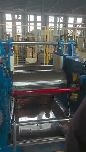 Lab open two roller mixing mill mixer machine with chest knock emergency shows.