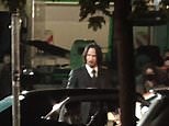 Keanu Reeves gets ready to film action-packed scene for 'John Wick 4' at night