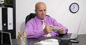 Businessman in Office Select Visit Cards and Dial Phone Number Using Landline