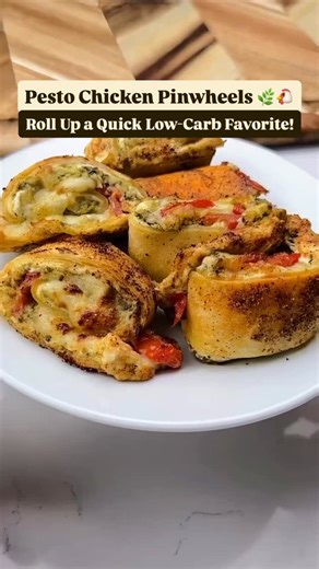 Pesto Chicken Pinwheels 🌿🐔 All the fresh, vibrant flavors of pesto, chicken, and tomato, rolled up into a perfect low-carb bite! So simple to make and delicious for a snack or quick lunch. 😋 🚨 Full recipe with tips, variations, and nutrition info: ➡️ https://keto.recipes/keto-pesto-chicken-pinwheels-a-tasty-low-carb-snack/ What You Need: 🌯 1 low-carb tortilla (like from @missionfoodsus) 🧀 1.5 oz cream cheese (softened) 🌿 1.5 tbsp pesto 🐔 1/4 cup cooked shredded chicken 🍅 2-3 tbsp halved