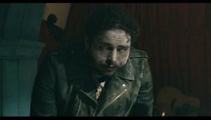 Post Malone embraces zombie fate in cinematic "Goodbyes" video